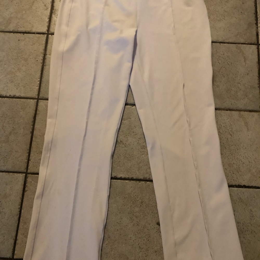 A white stretchy pant by designer Bylyse Spenard